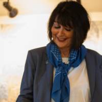 President Mantella flipping a pancake on a griddle.